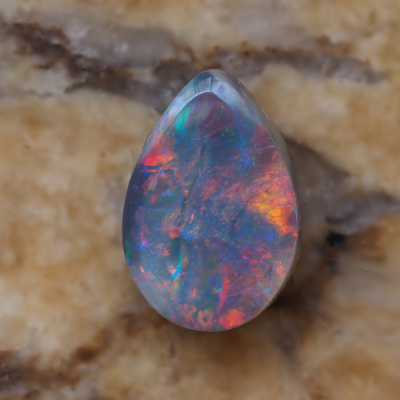 Natural Australian opal from the Christianos Opals collection, showing play-of-colour